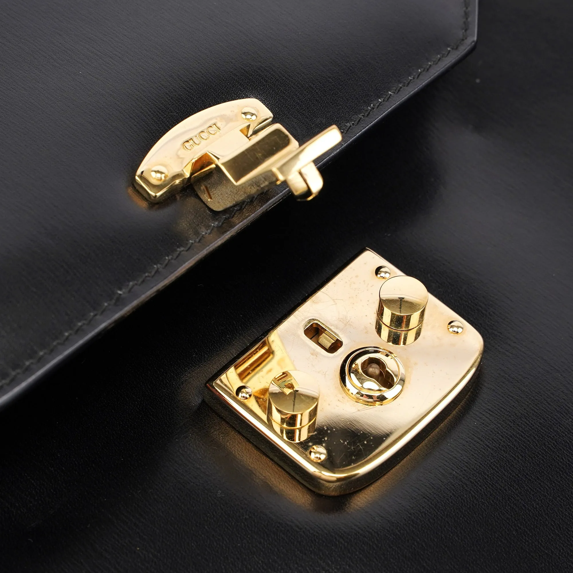 Black Calfskin Lady Lock Top Handle Bag